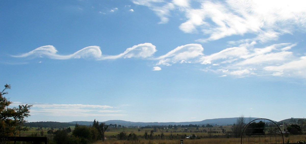 Wave clouds from Kelvin-Helmholtz instabilities forming over Mount Duval, NSW in Australia. Courtesy GRAHAMUK, via Creative Commons Attribution-Share Alike 3.0 Unported