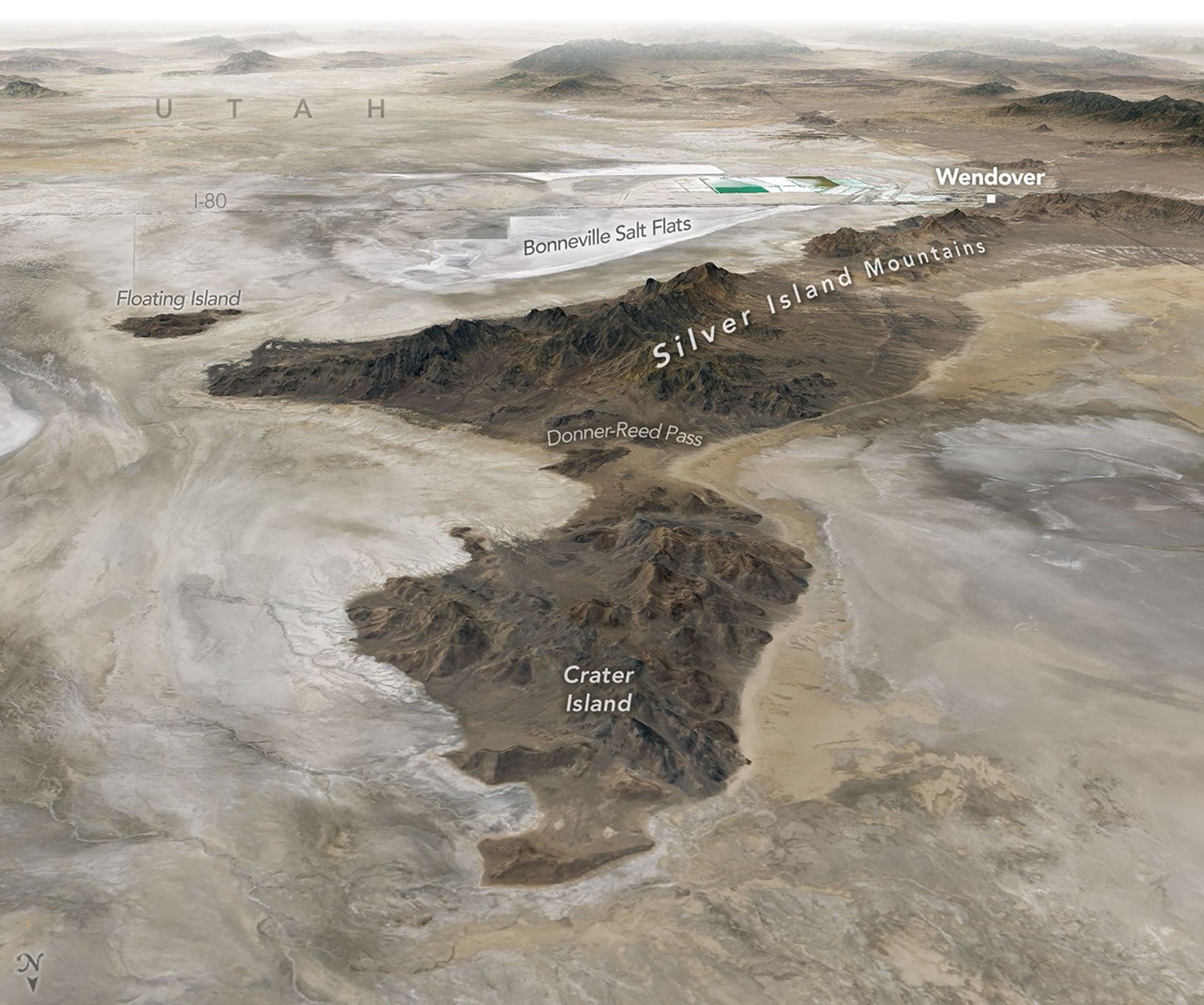 Tan and white plains surround a dark mountainous ridge in a three-dimensional image of the Silver Island Mountains.