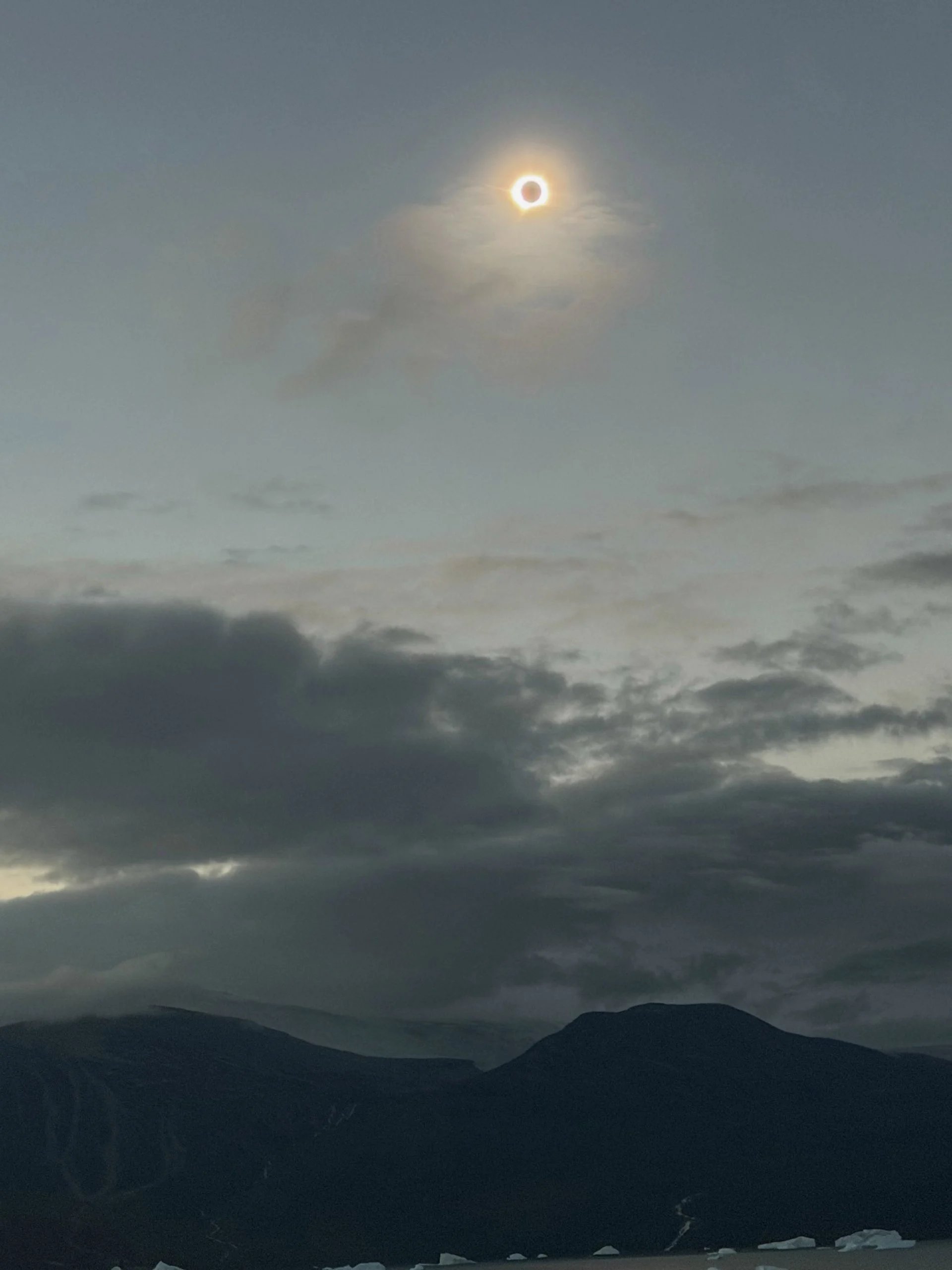 Totality! Caught through a lucky break in the clouds. Credit: Polly Scott-White.