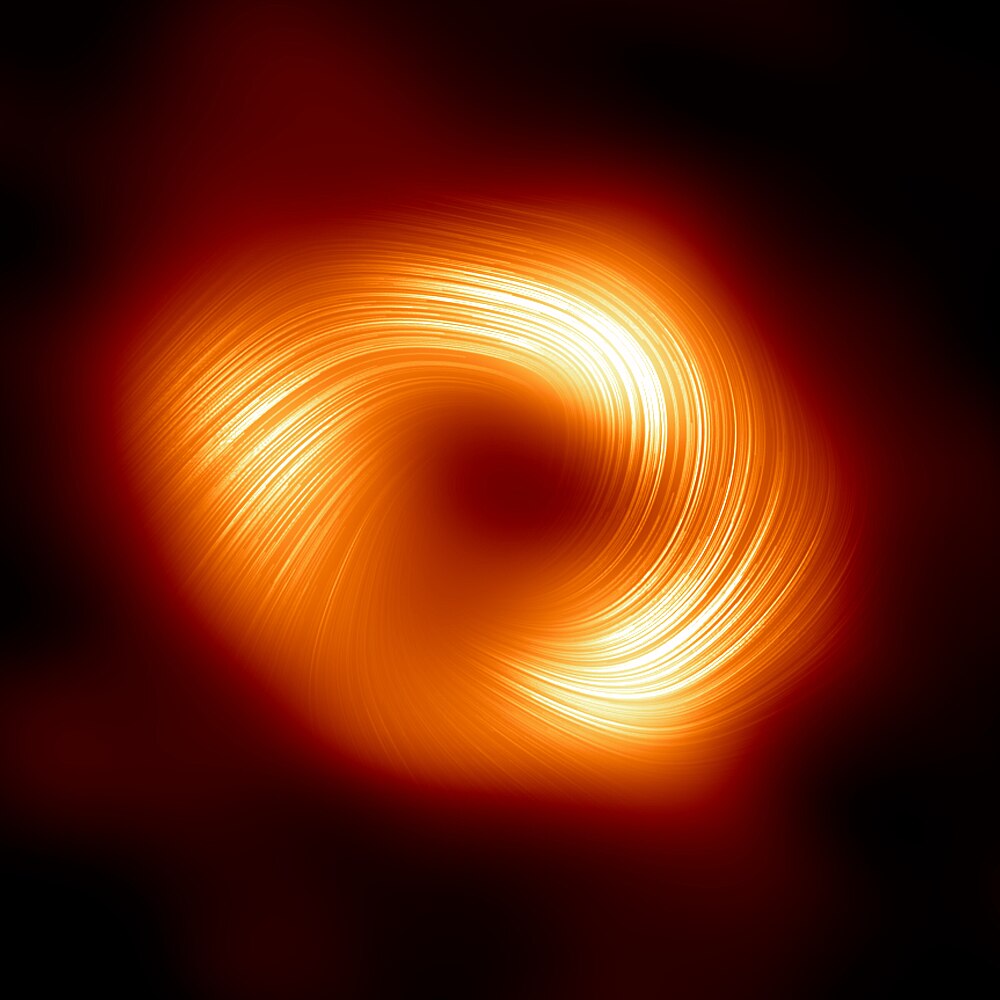Samanyolu Galaksisi'nin merkezindeki Sagittarius A* kara deliğinin etrafındaki güçlü manyetik alan çizgilerini gösteren polarize ışık görüntüsü