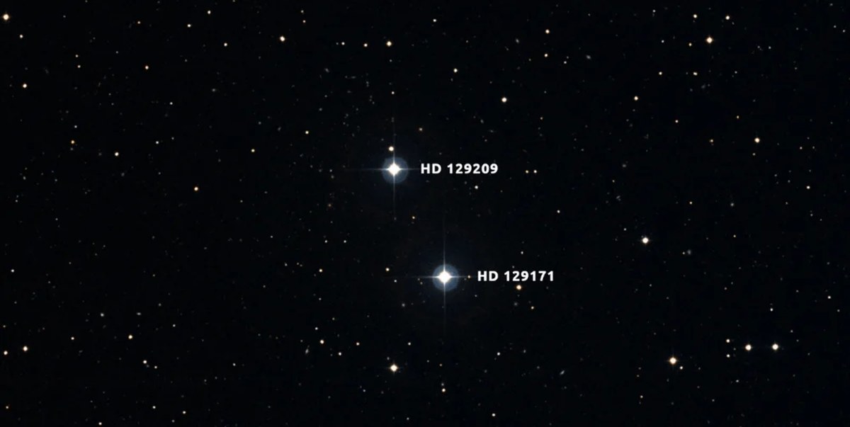 HD 129209/HD 129171 is a binary pair of Sun-like stars about 180 light years away. The differences in their Beryllium abundances suggest that HD 129171 engulfed a rocky planet in its past. The research shows it absorbed about 11 Earth masses of rocky material. Image Credit: Digital Sky Survey/Aladin/Anne Rathsam.