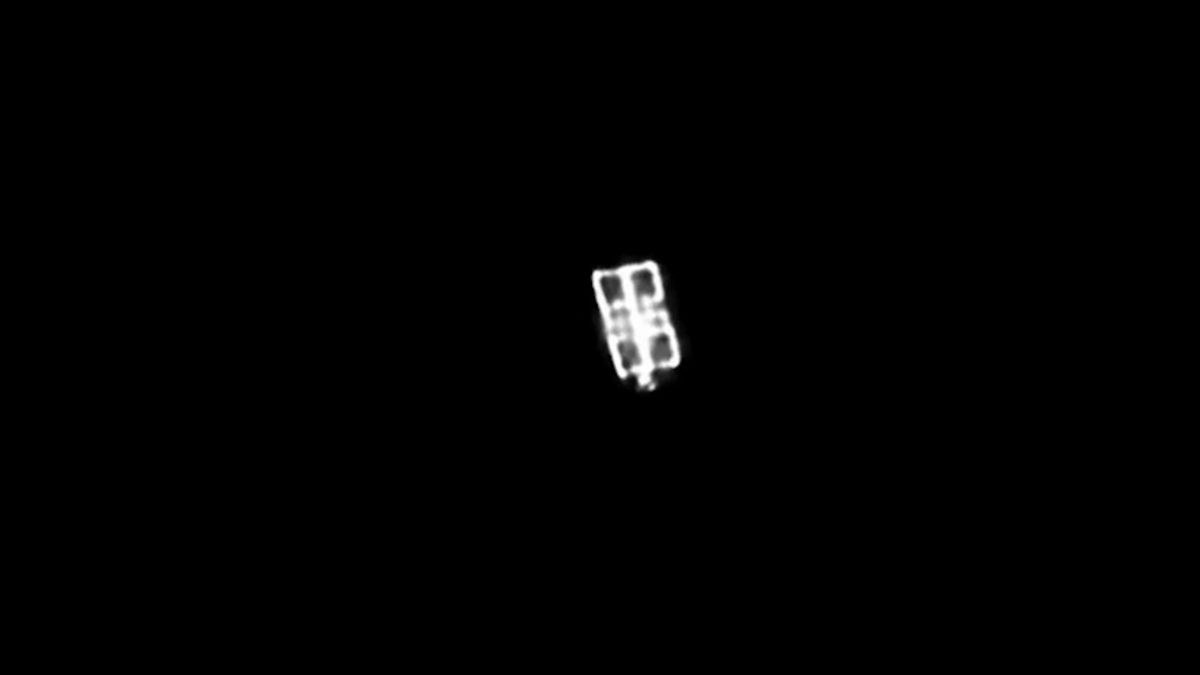 a white cube on a black background