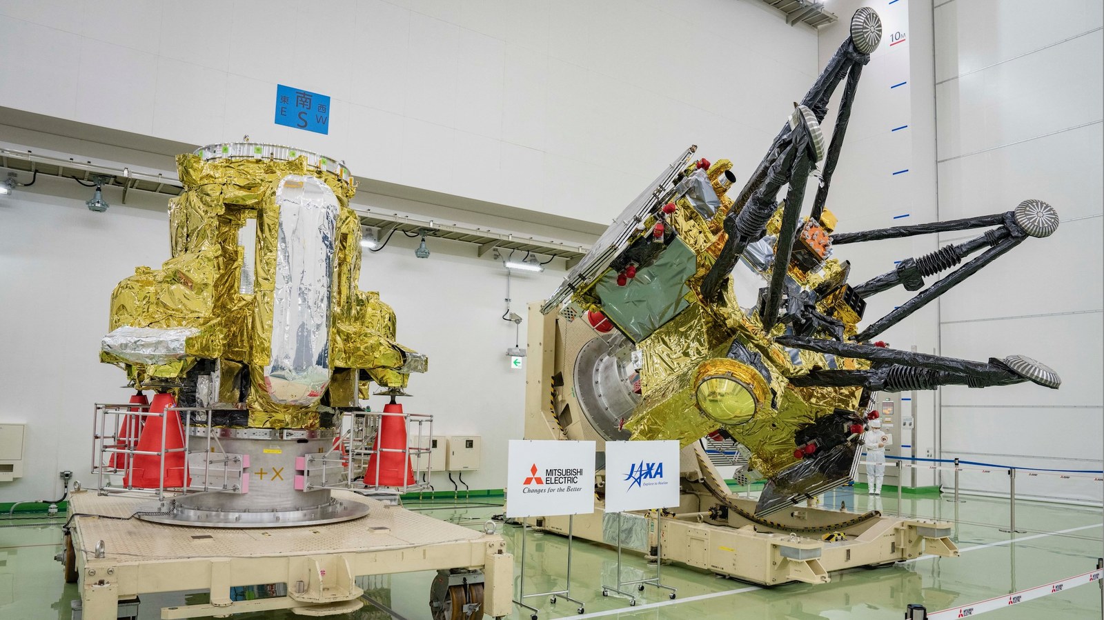 The Propulsion Module (left) and Exploration and Return Modules (right), which together make up Japan’s Martian Moons eXploration (MMX) spacecraft, are seen at the Tanegashima Space Center in Minamitane, Kagoshima prefecture on Aug. 13, 2026.