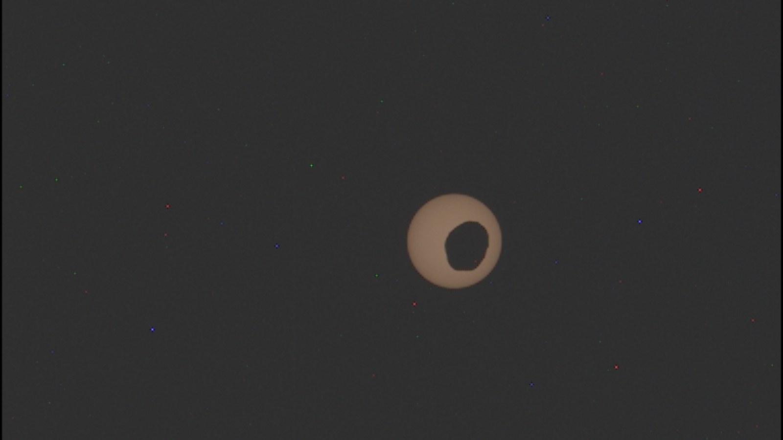 A yellowish sun against a black background is partially obscured by a Martian moon.