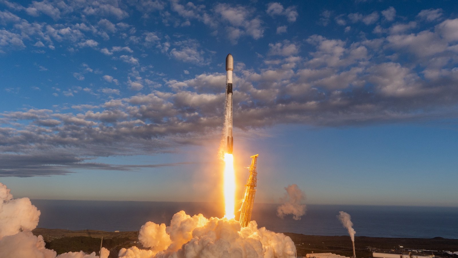 A SpaceX Falcon 9 rocket launches 27 Starlink satellites into orbit from Vandenberg Space Force Base in California on Sept. 6, 2026.