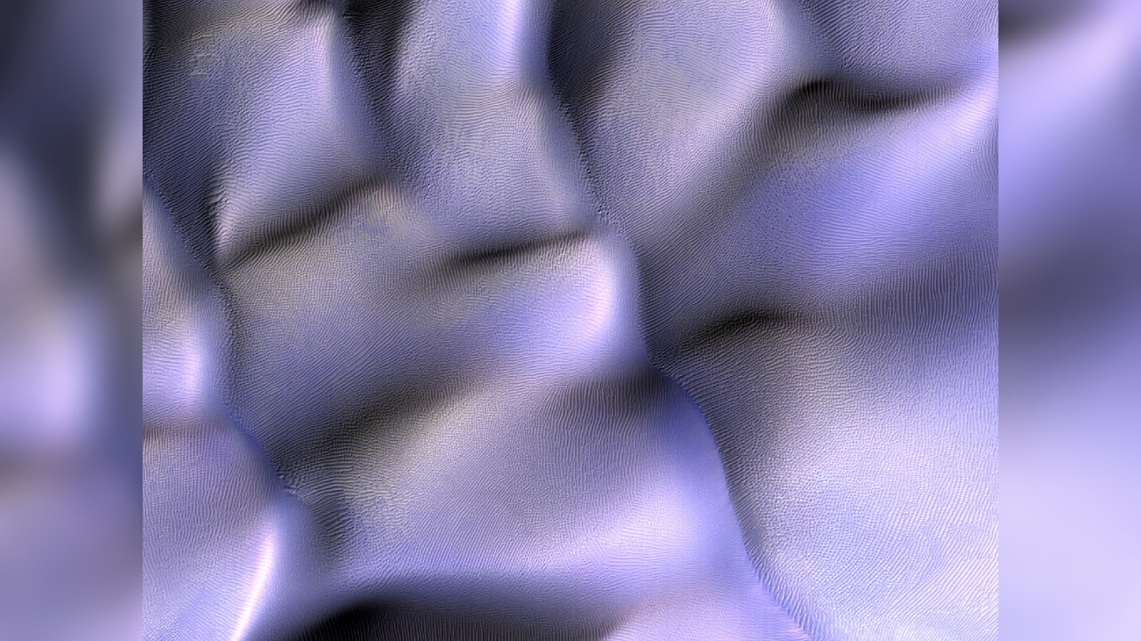 Purple colored dune fields on Mars.