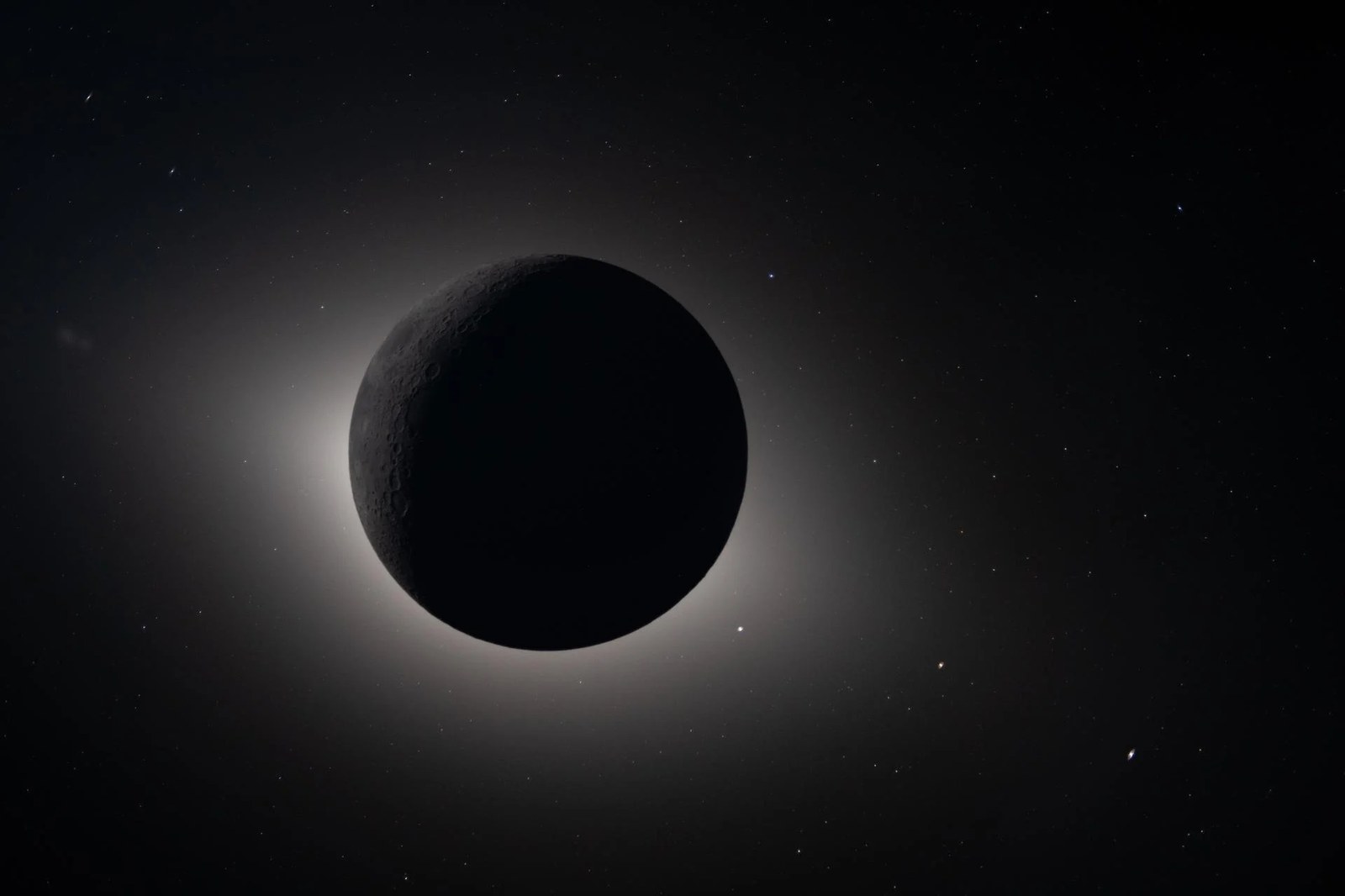Captured by the Artemis II crew during their lunar flyby on April 6, 2026, this image shows the Moon fully eclipsing the Sun. Credit: NASA